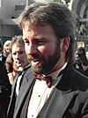 https://upload.wikimedia.org/wikipedia/commons/thumb/b/b4/John_Ritter_at_the_1988_Emmy_Awards.jpg/100px-John_Ritter_at_the_1988_Emmy_Awards.jpg